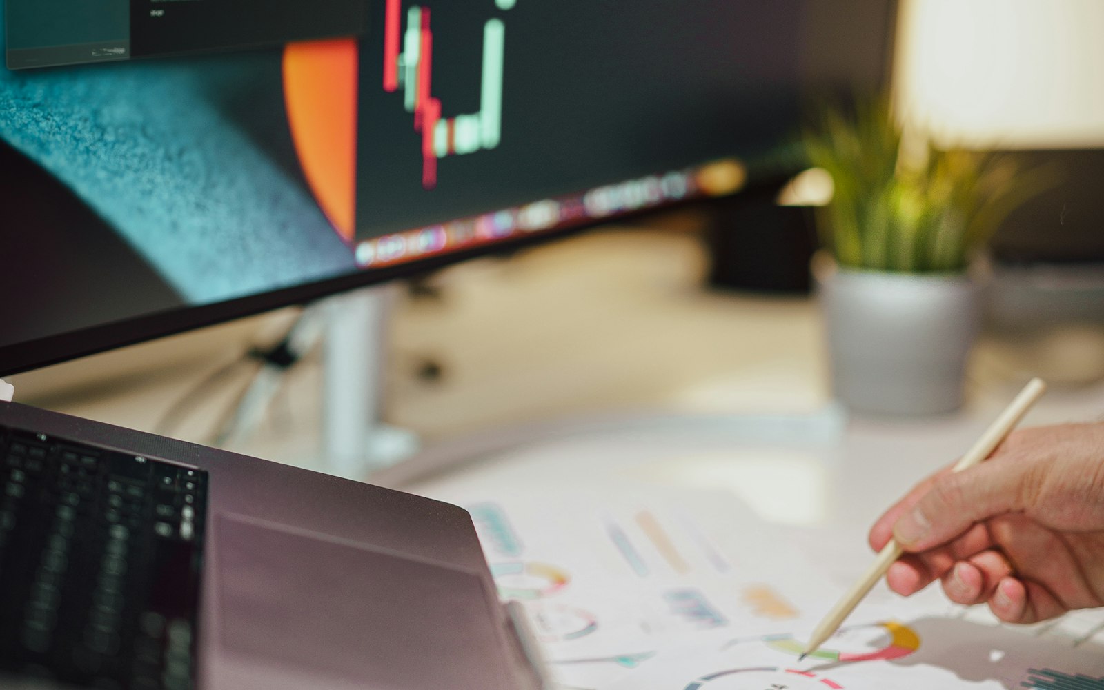 Reviewing digital business analytics and charts at a desk - building strong foundations