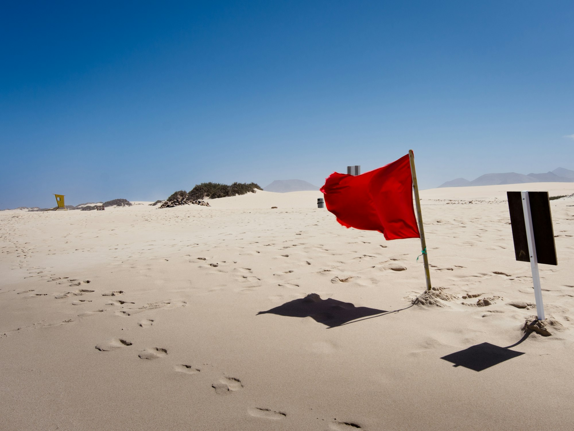 Red flag waving, representing warning signs when vetting a guest post seller