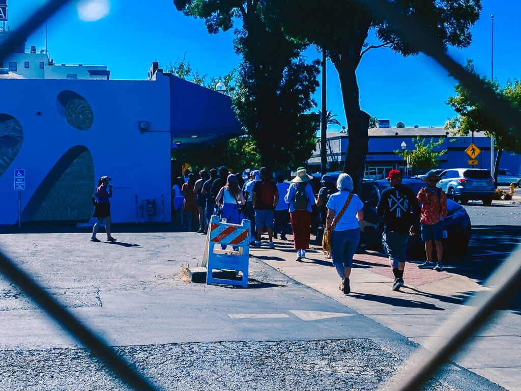 Attendees using smartphones to share content during a community-driven event