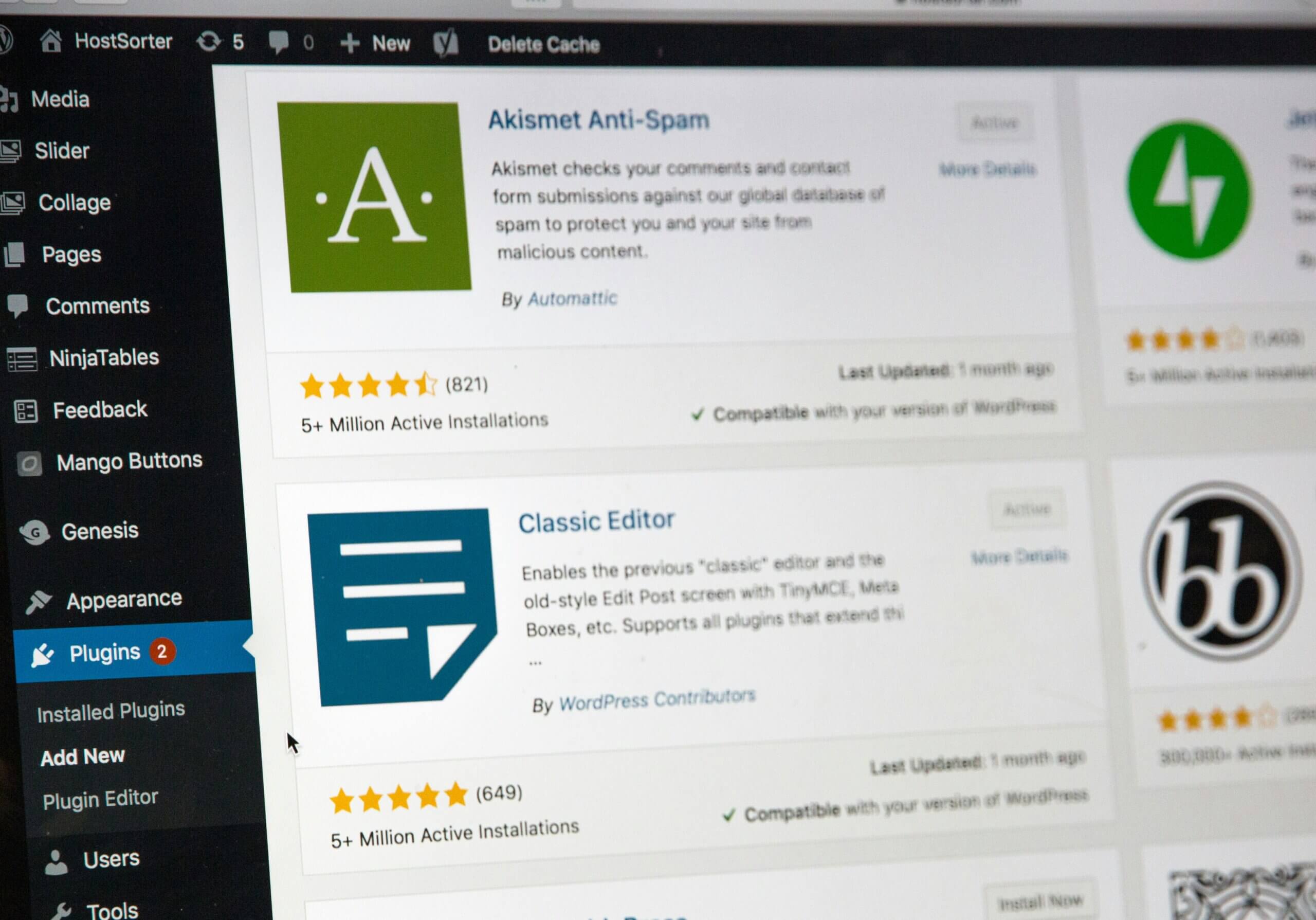 Close-up view of a WordPress dashboard on a computer screen showing website editing tools and content management options.